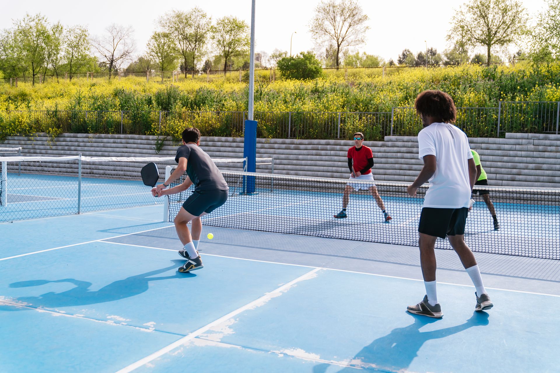 Pickleball players on the court